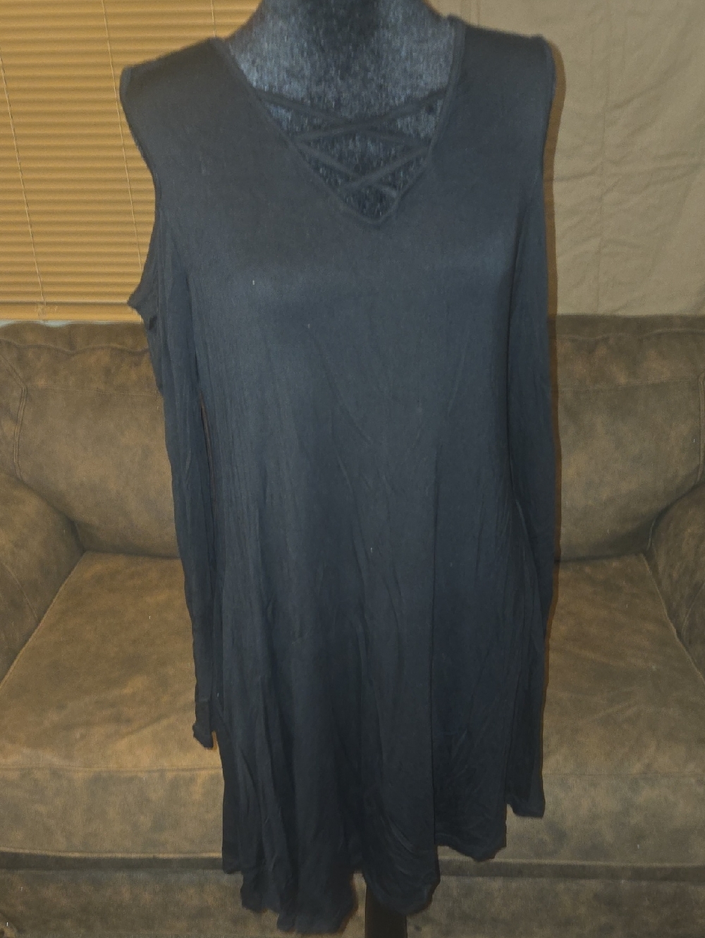 Sleeveless Black V-Neck Tunic with Crisscross Detail